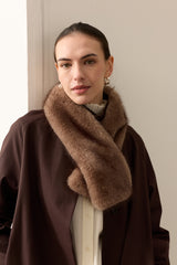 Model wearing an Ash faux fur Tippet scarf by Helen Moore