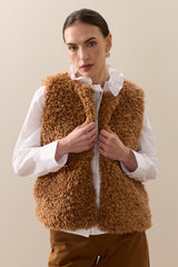 Model wearing Teddy faux sheepskin gilet by Helen Moore