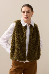 Model wearing Forest Green faux sheepskin gilet by Helen Moore