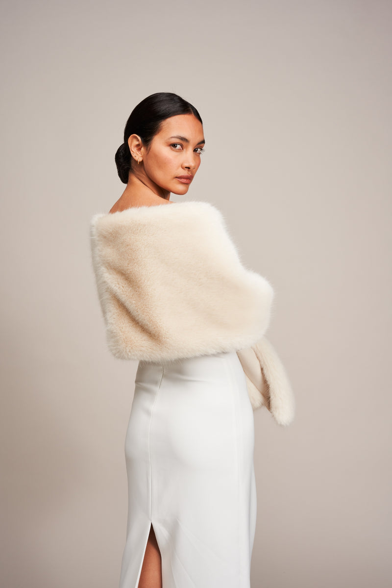Model wearing Ermine white Stole Cover Up by Helen Moore