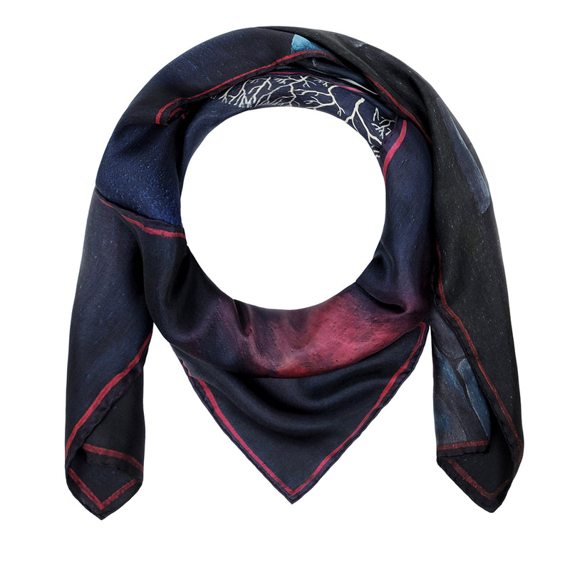 Silk scarf featuring a painting by Stanley Moore called Wall Dancer.