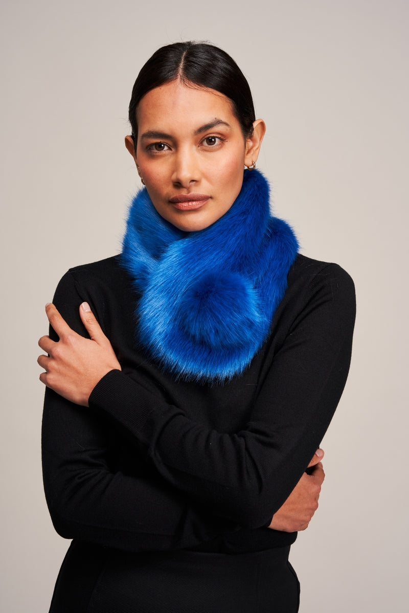 Model wearing a Royal Blue faux fur Pom Collar by Helen Moore