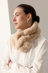 Model wearing the Biscuit Cloud faux fur Ruffle Scarf by Helen Moore