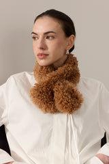 Model wearing a faux sheepskin Tiptop Scarf in Teddy brown by Helen Moore