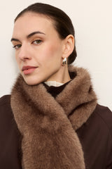 Model wearing an Ash faux fur Tippet scarf by Helen Moore