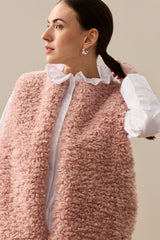 Model wearing Rose faux sheepskin gilet by Helen Moore