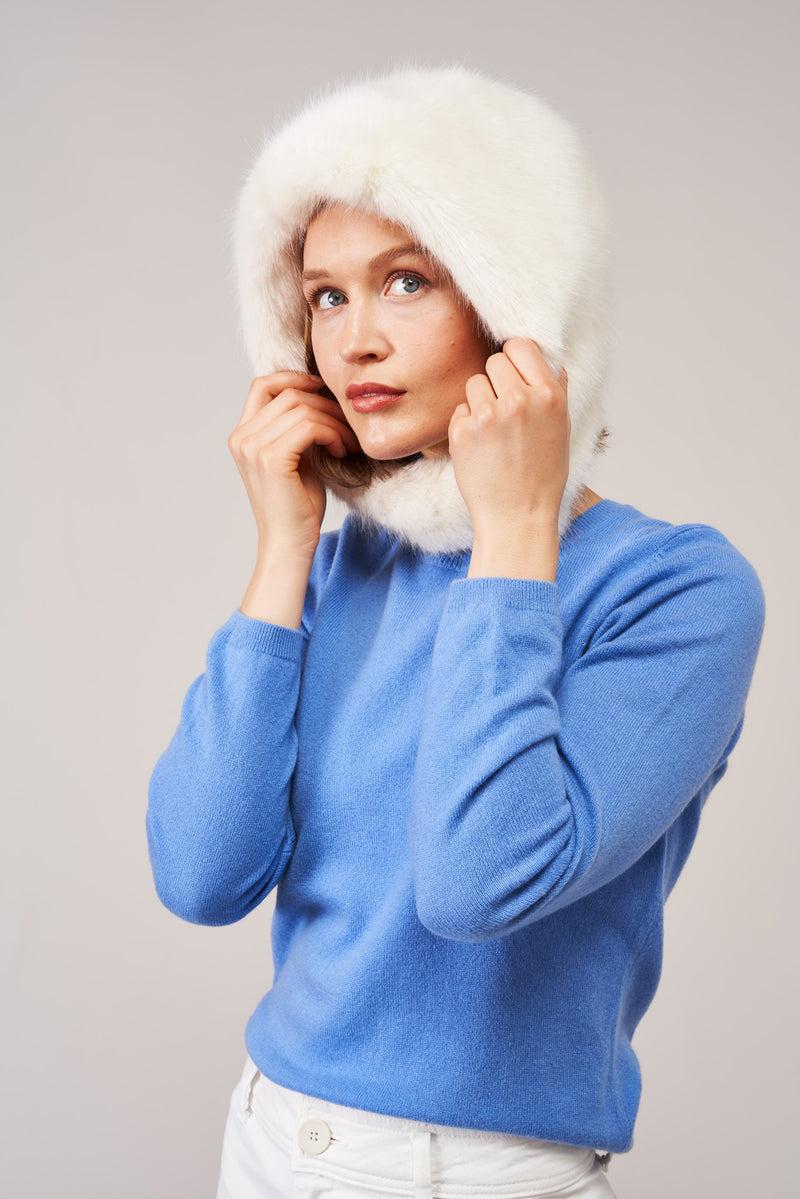 Model wearing the Ermine cream faux fur Hood by Helen Moore