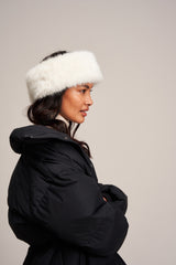 Model wearing an Ermine white faux fur Huff headband by Helen Moore