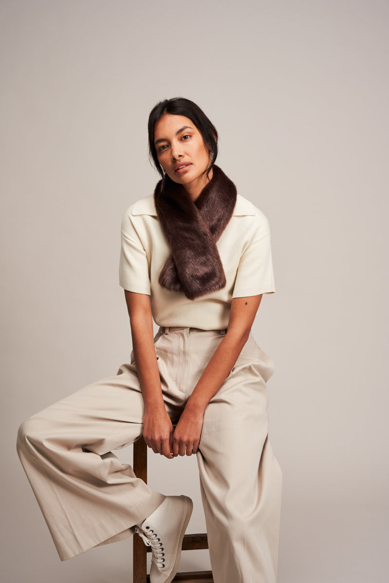 Model wearing a Conker Brown faux fur Tippet Scarf by Helen Moore