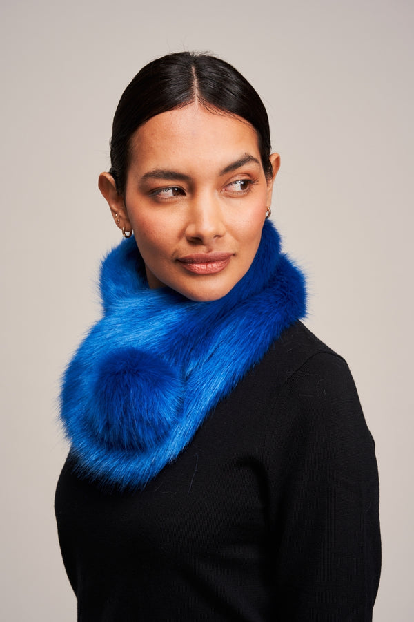 Model wearing a Royal Blue faux fur Pom Collar by Helen Moore