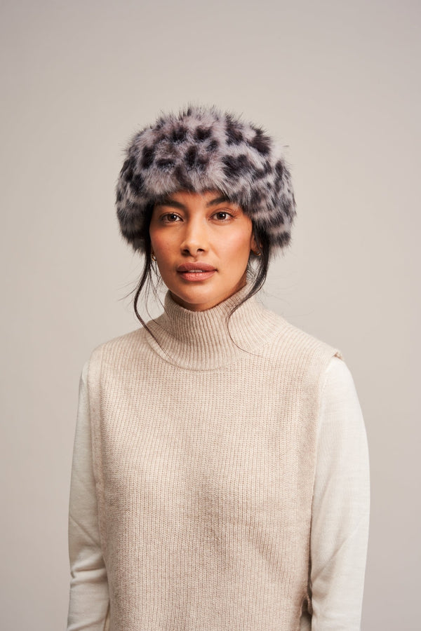 Model wearing a Silver Leopard faux fur Huff headband by Helen Moore