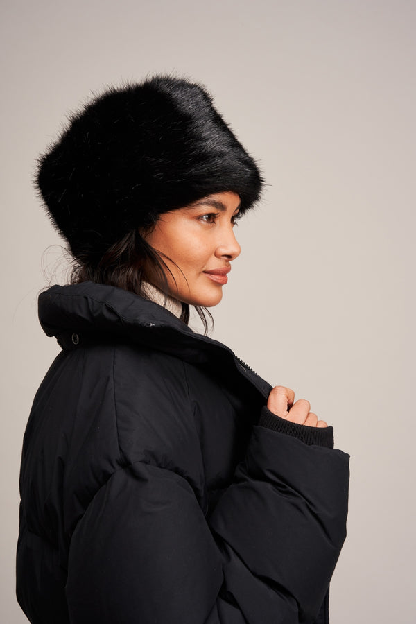 Model wearing Jet black faux fur Pillbox Hat by Helen Moore