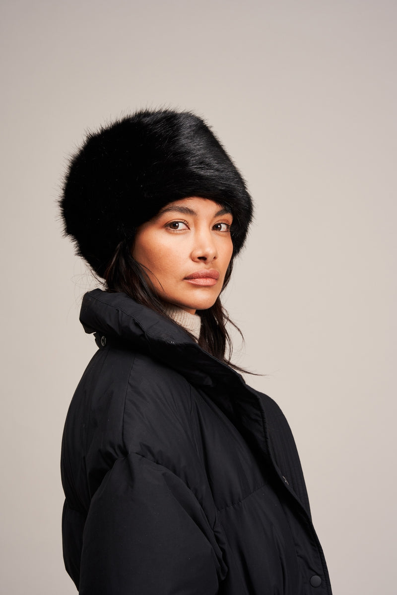 Model wearing Jet black faux fur Pillbox Hat by Helen Moore