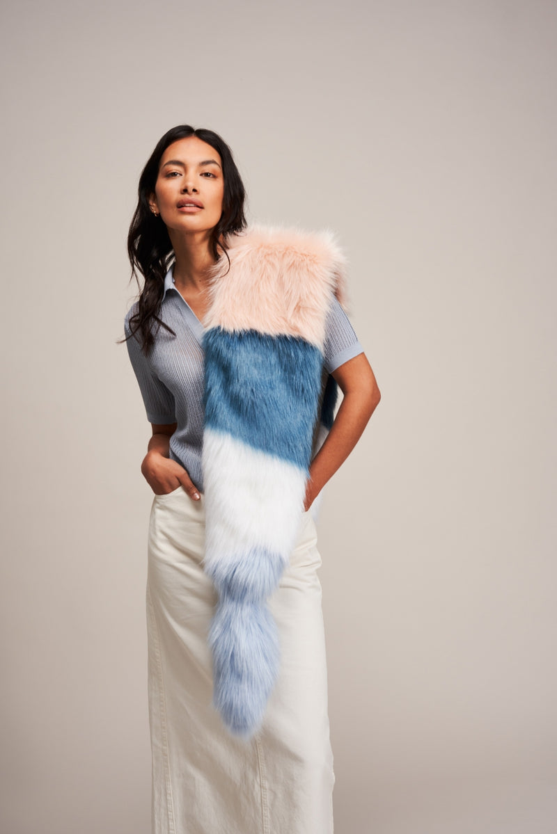 Model wearing a Multi Vixen faux fur scarf by Helen Moore in blue, pink and white.