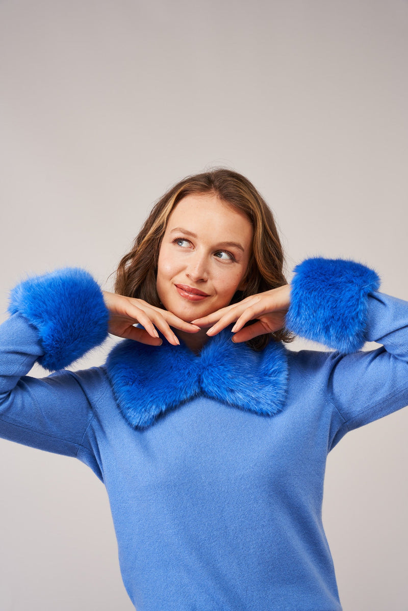 Model wearing Royal Blue faux fur wrist warmer cuffs by Helen Moore with a matching collar