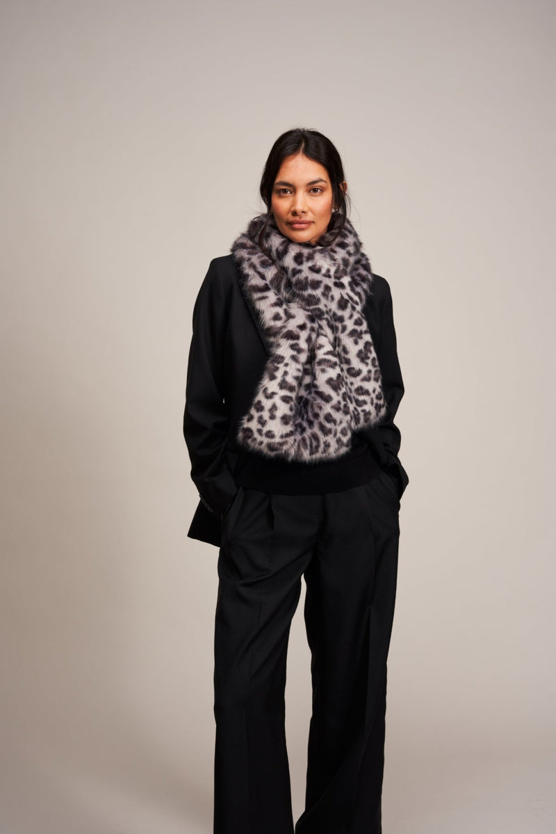 Model wearing a faux fur Silver Leopard Luxe scarf by Helen Moore