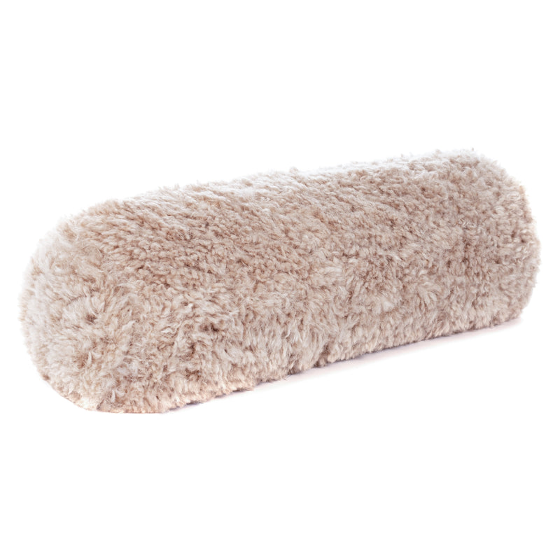 Beige faux sheepskin bolster cushion by Helen Moore