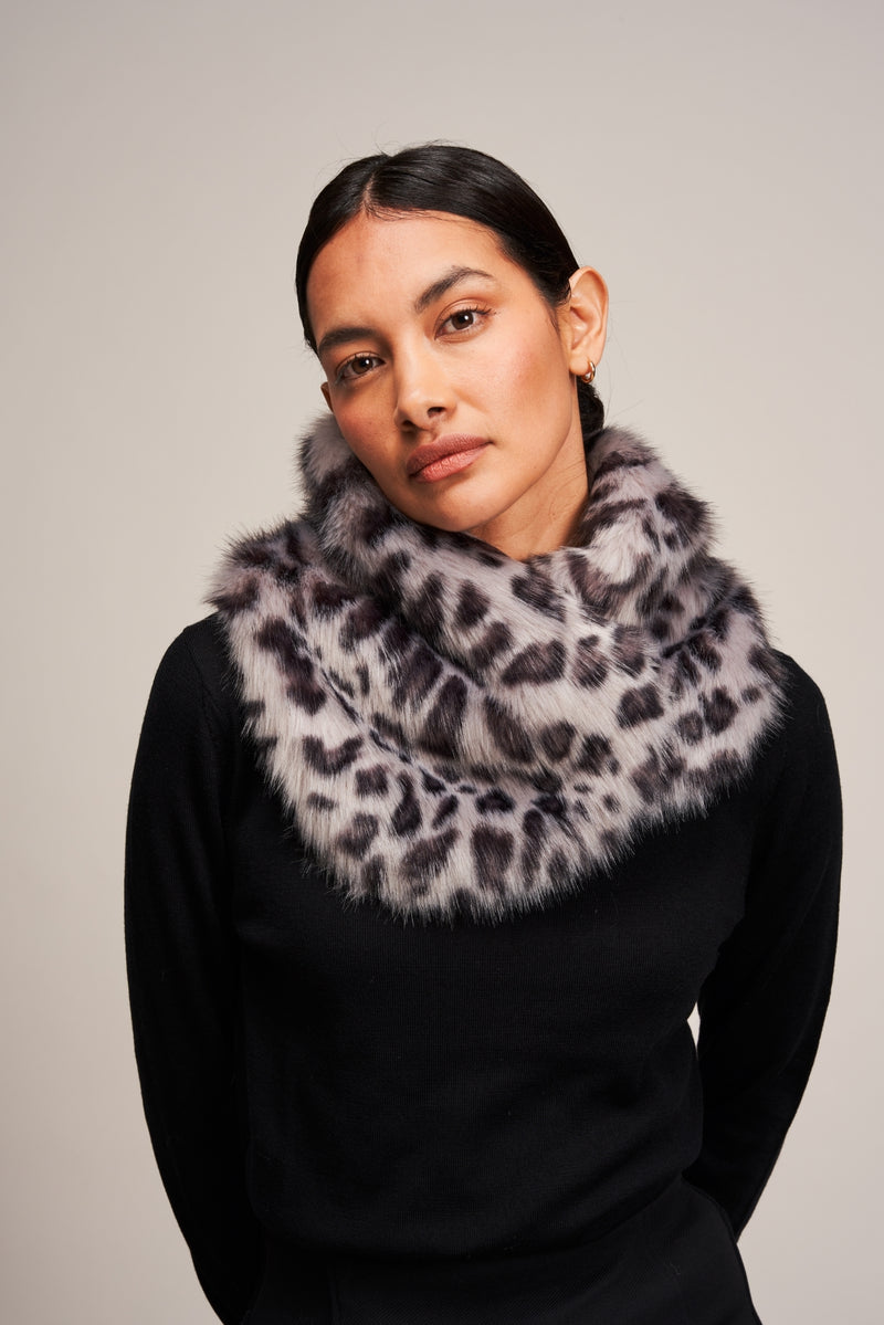 Model wearing faux fur silver leopard animal print Coco scarf by Helen Moore