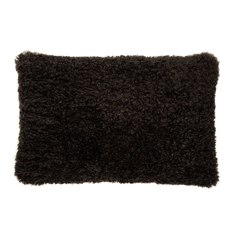 Faux sheepskin rectangular cushion in black by Helen Moore