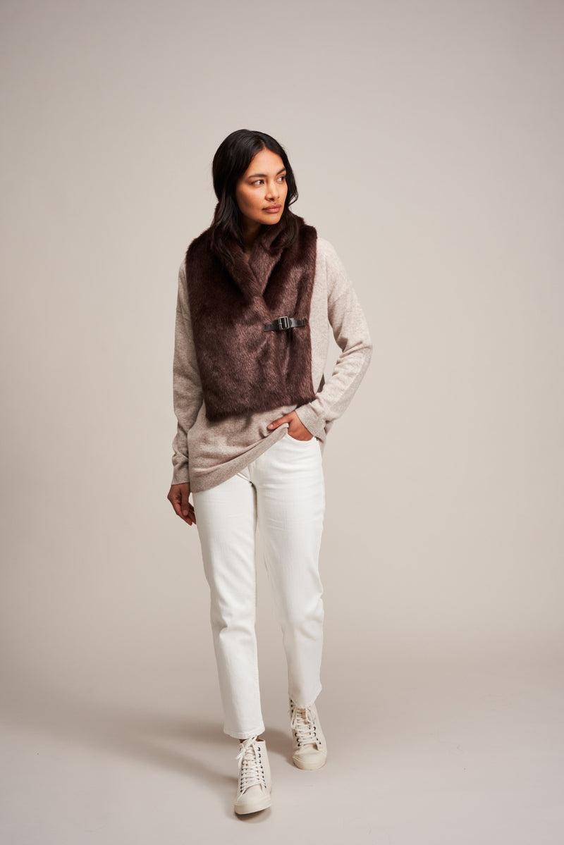 Model wearing Conker Brown faux fur buckle scarf by Helen Moore