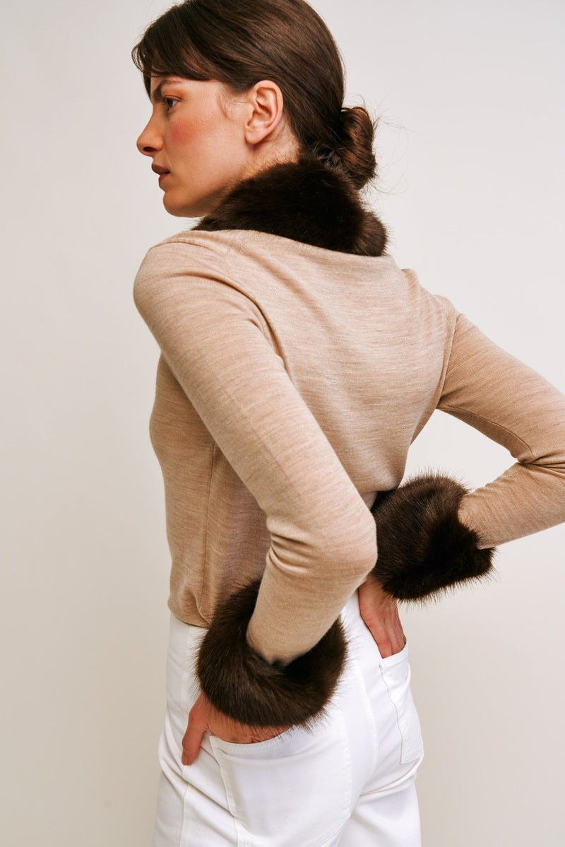 Model wearing  faux fur wrist warmer cuffs by Helen Moore with a matching collar