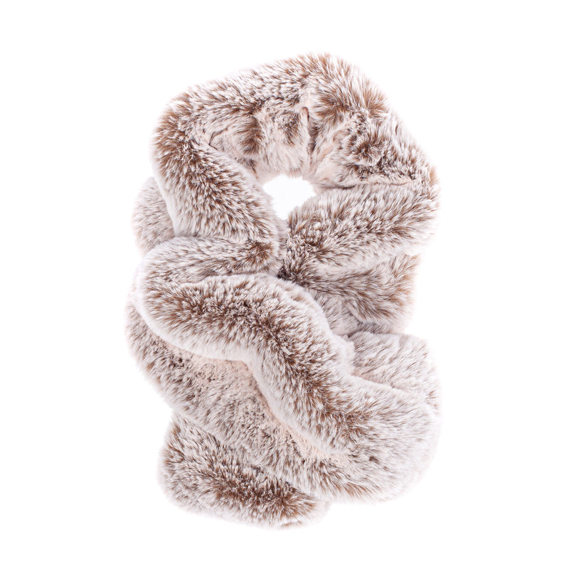 A beige faux fur scarf which is gathered to create a ruffle effect. Made in England by Helen Moore