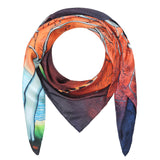 Silk scarf featuring a painting by Stanley Moore called Leaping Jaguar.