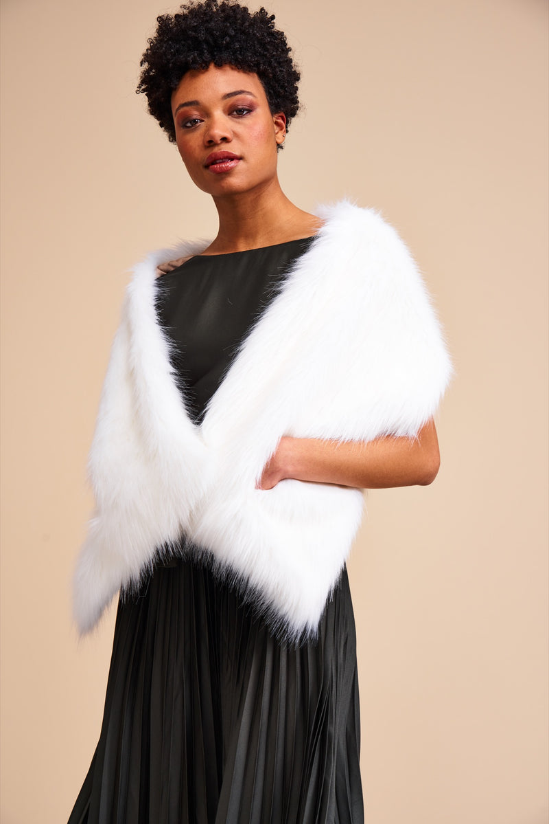 Model wearing Whisper white faux fur pocket stole from the wedding collection by Helen Moore