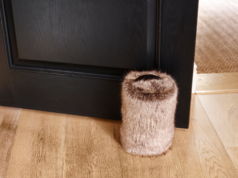 Light brown Truffle faux fur doorstop with embossed leather handle by Helen Moore