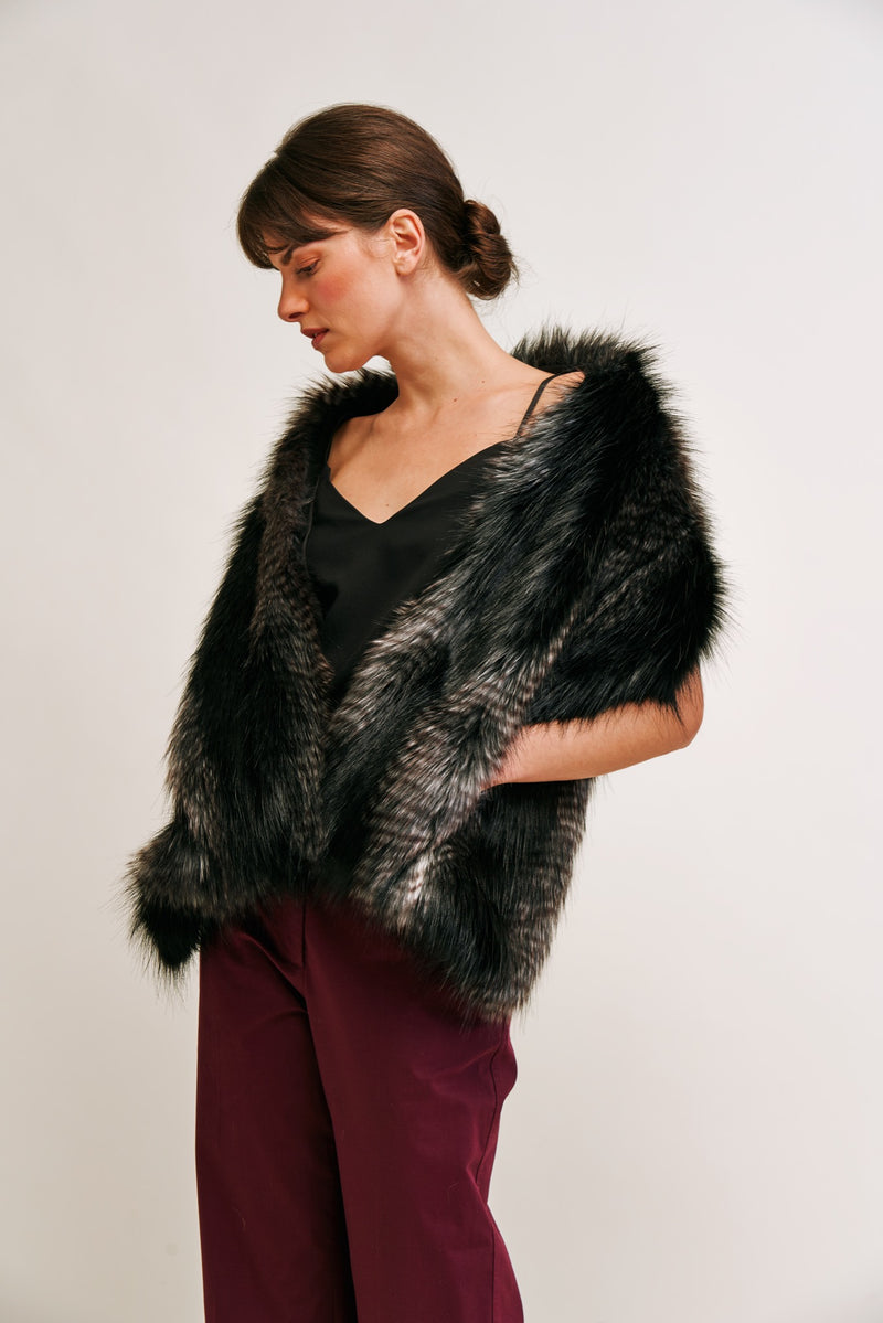 Model wearing black and grey faux fur pocket stole by Helen Moore