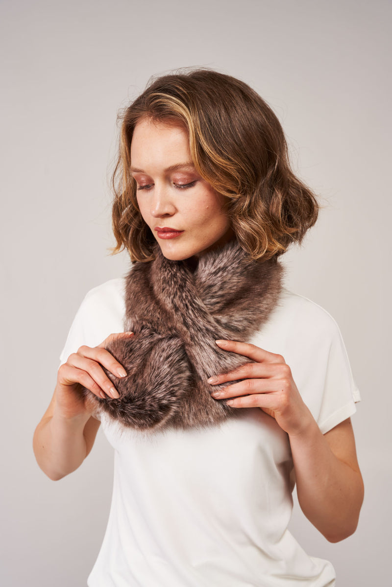Model wearing the faux fur Tiptop scarf by Helen Moore in Truffle brown