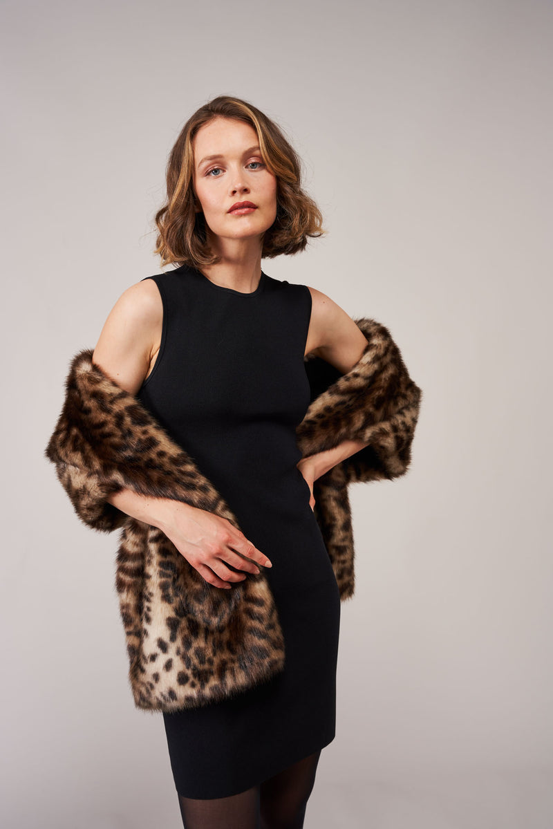 Model wearing an Ocelot animal print faux fur stole by Helen Moore