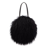 Round bag by Helen Moore in Black shearling faux fur